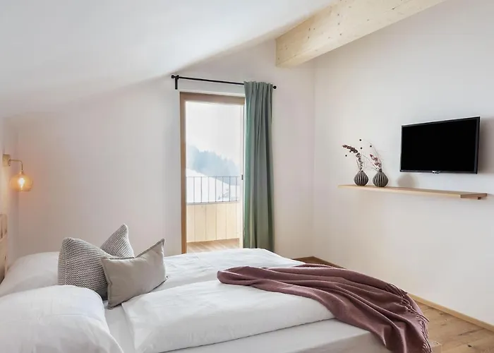 Aparthotel Holzhackerin - The Charming Haus Am Berg 4*